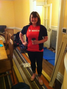 Girl in moveline shirt holding coffee