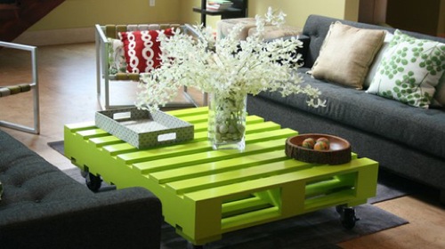 Table surrounded by chairs and sofas.
